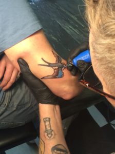 oldschool swallow tattoo