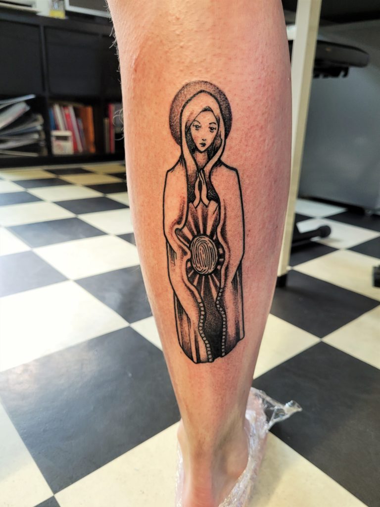 maria tattoo leg