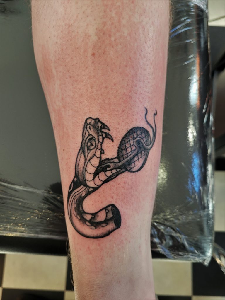 snake tattoo with stroopwafel