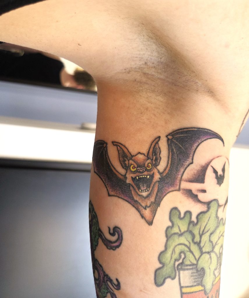bat tattoo arm