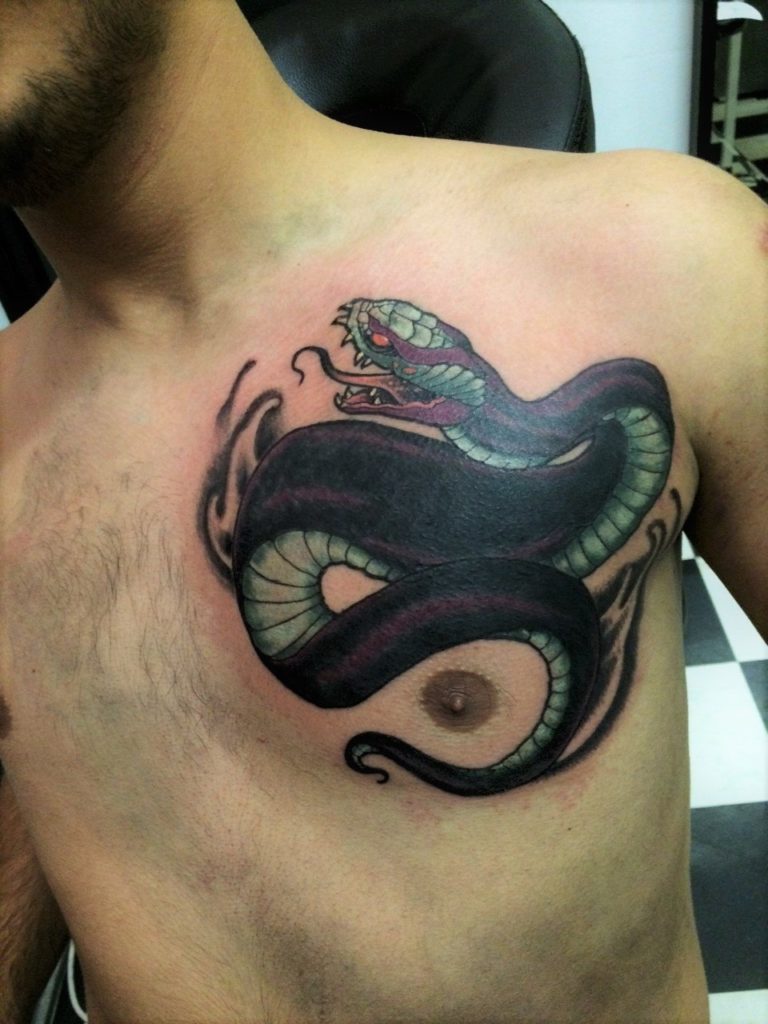 snake chest tattoo coverup