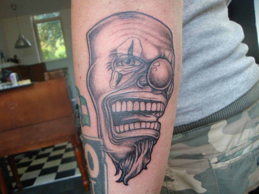 Evil crying Chicano-clown tattoo, by Inkfish tattooshop Rotterdam.