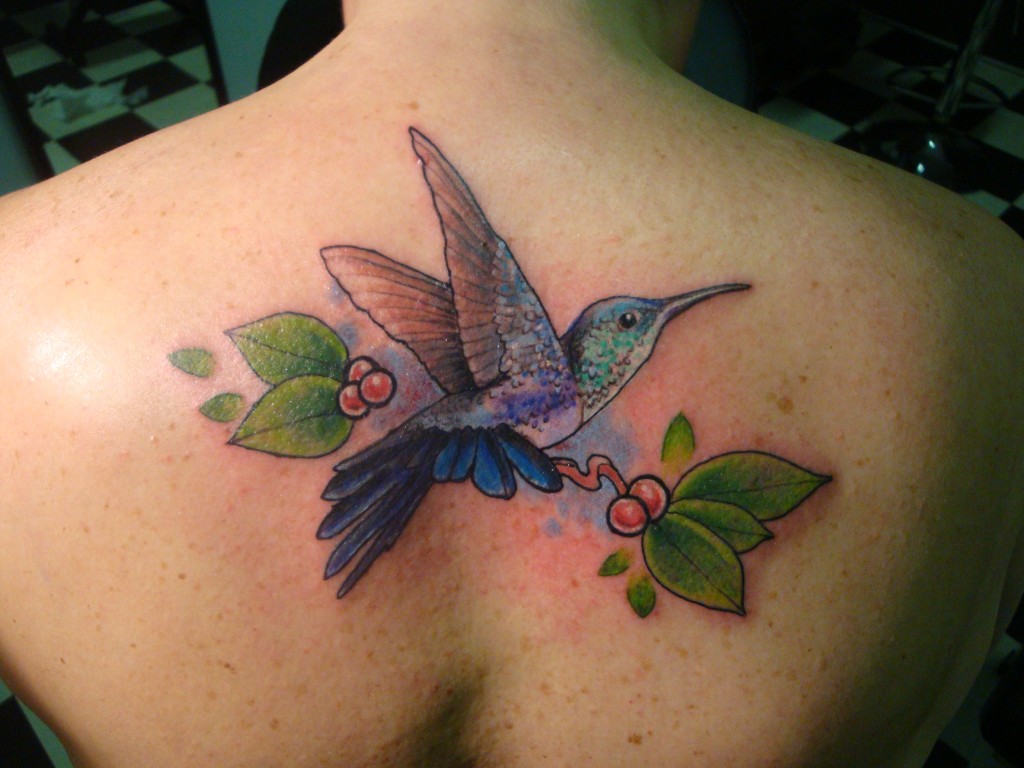 Realistic fullcolor nature-tattooing at studio Inkfish.
