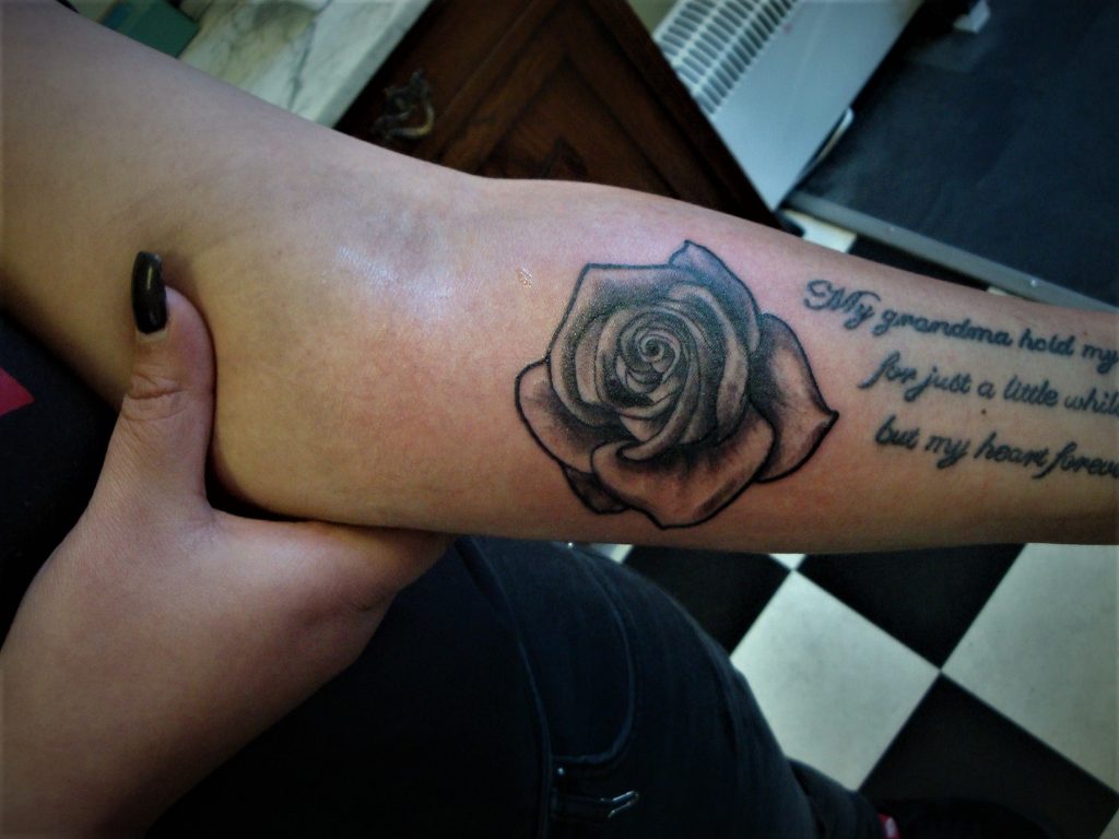 rose tattoo arm