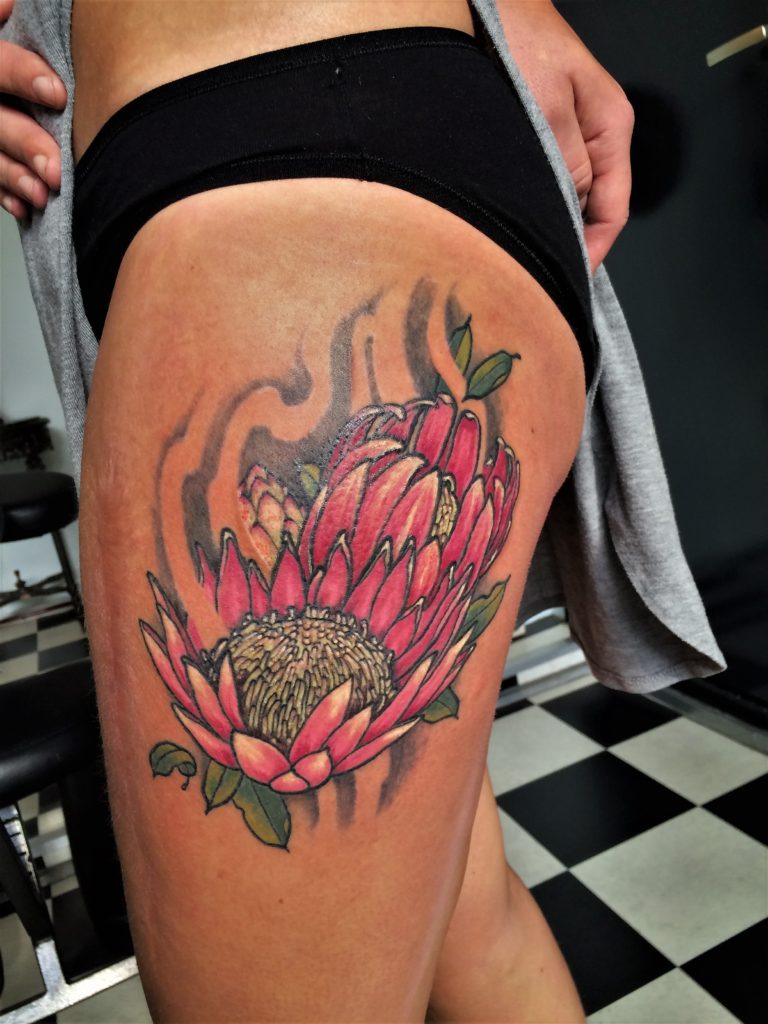 Flower leg tattoo from our tattoostudio