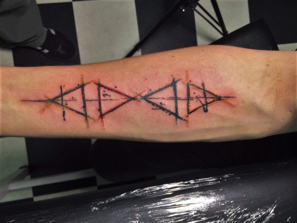 geometric arm tattoo in our tattooshop gallery!