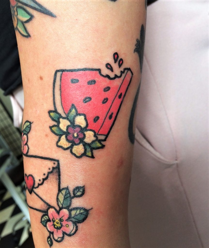 tattoo of watermelon and love letter