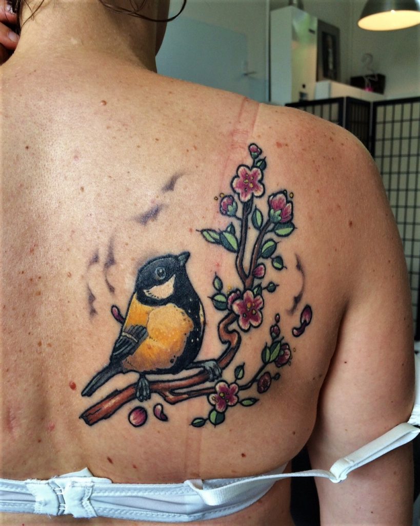 our tattooshop gallery has a bird cherryblossom shoulder tattoo from inkfish rotterdam, 