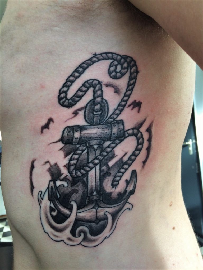 anchor side tattoo from our custom studio.