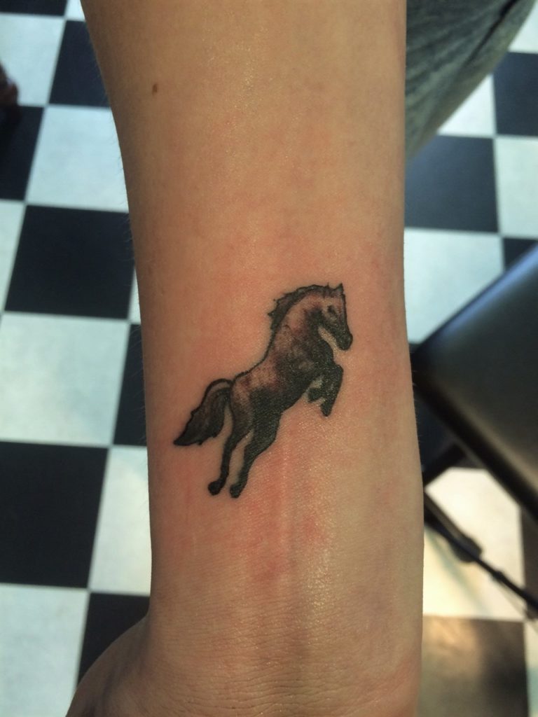 tattoo horse arm by inkfish tattoo shop