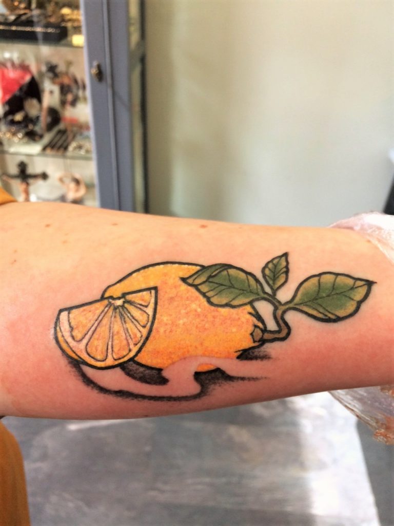 lemon arm tattoo from Inkfish