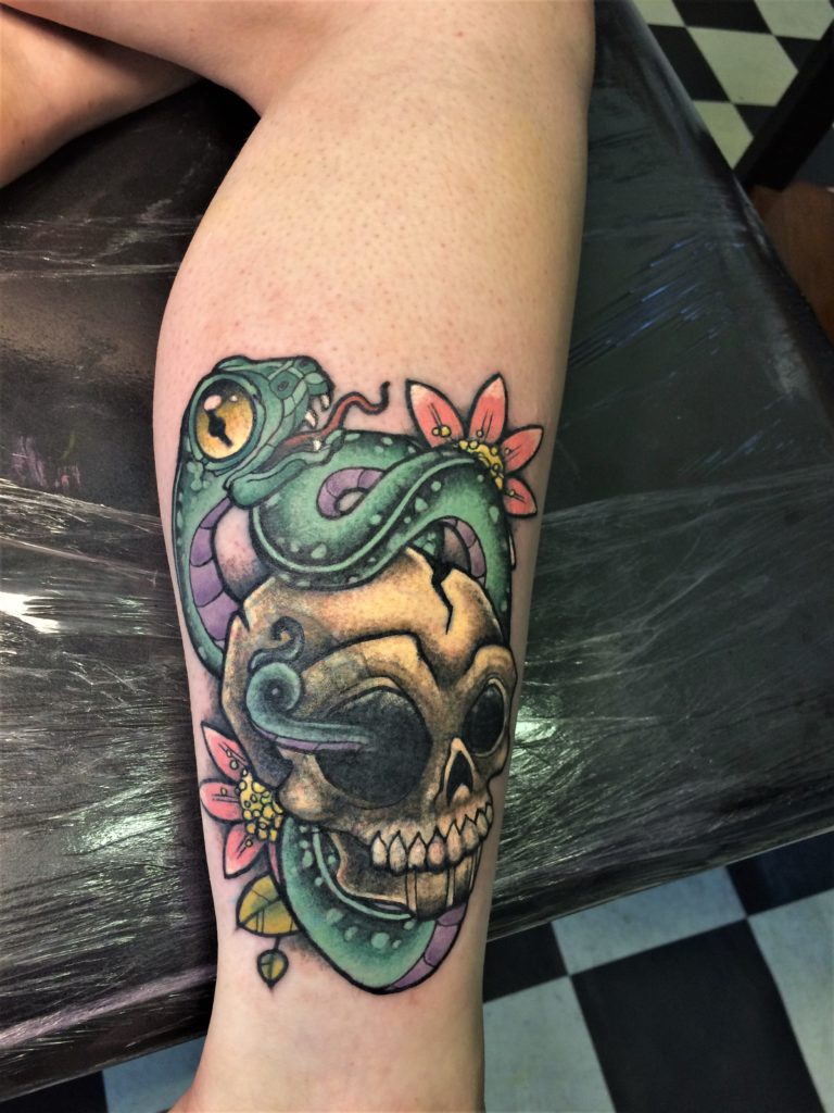 skull and snake tattoo coverup