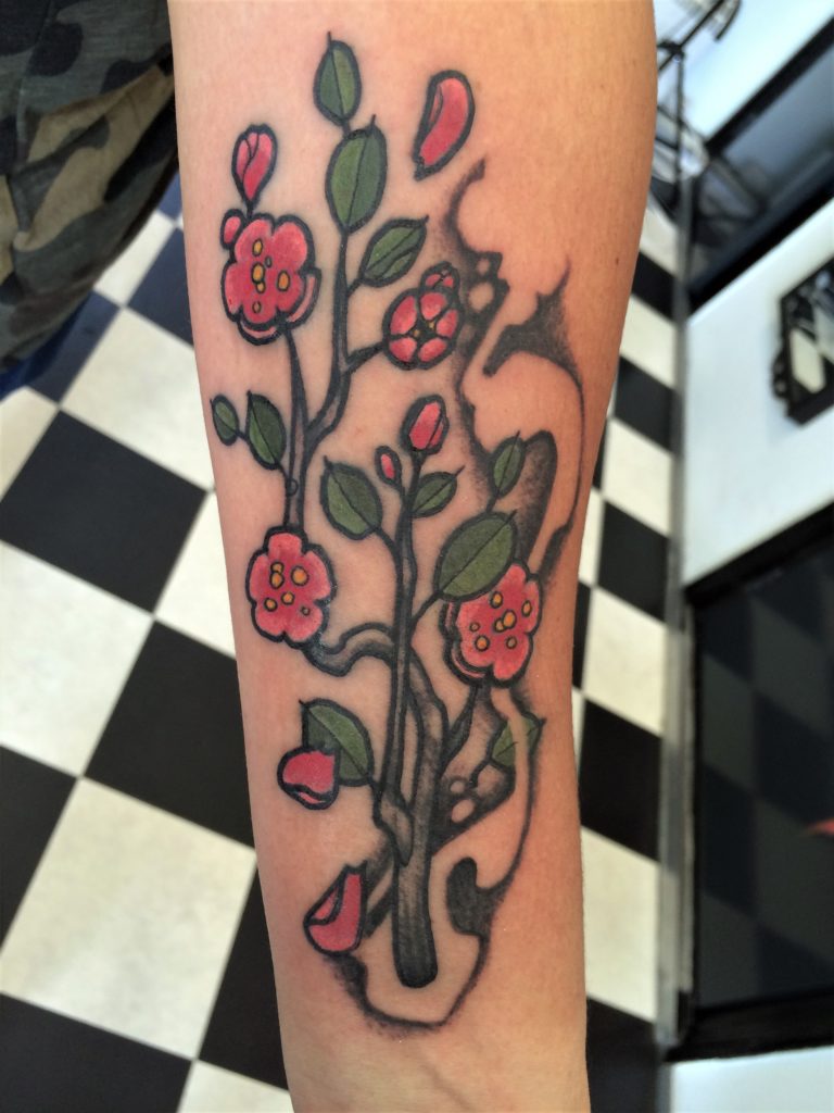 cherry blossom arm tattoo