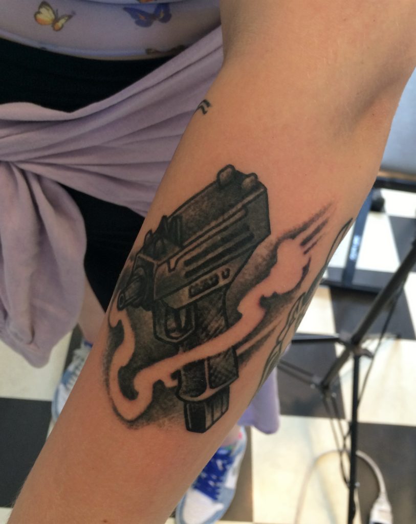 gun tattoo