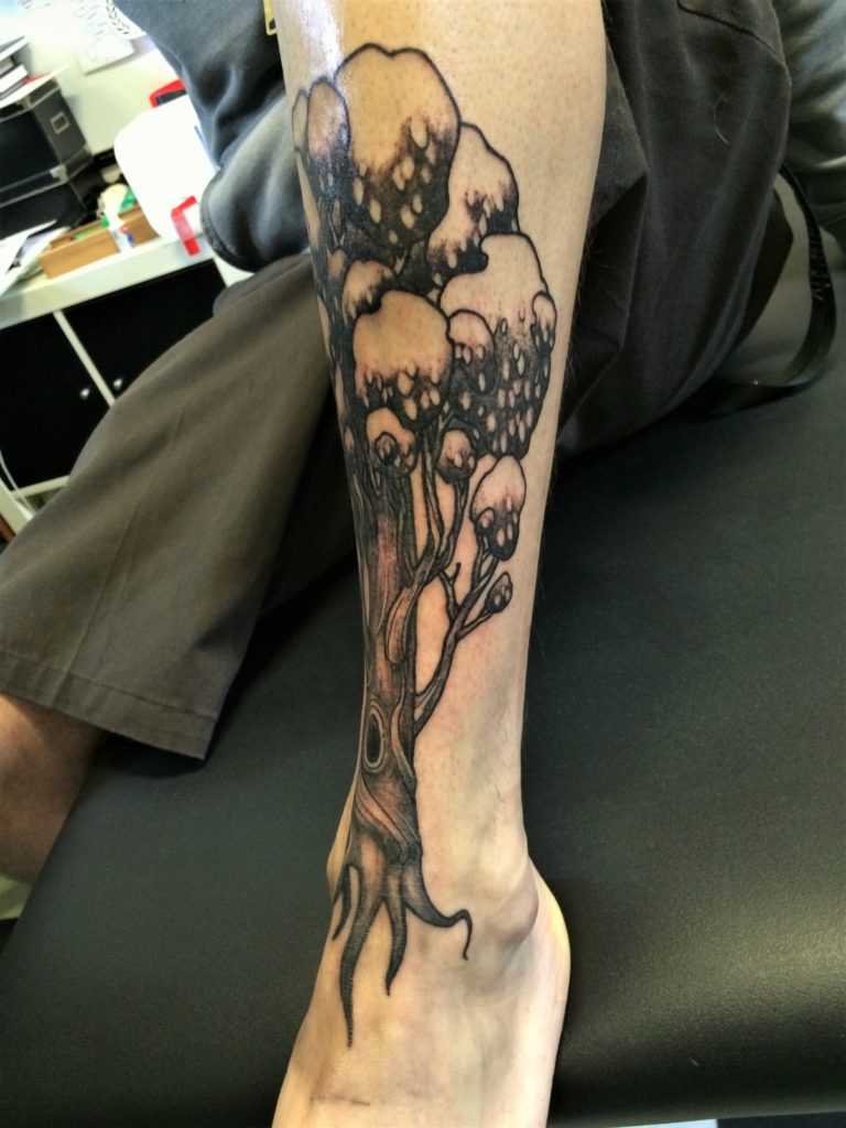 tree tattoo leg