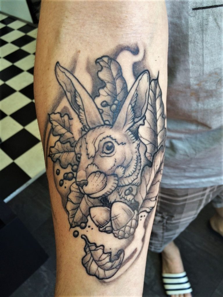 Rabbit arm tattoo from our tattoo studio in Rotterdam.